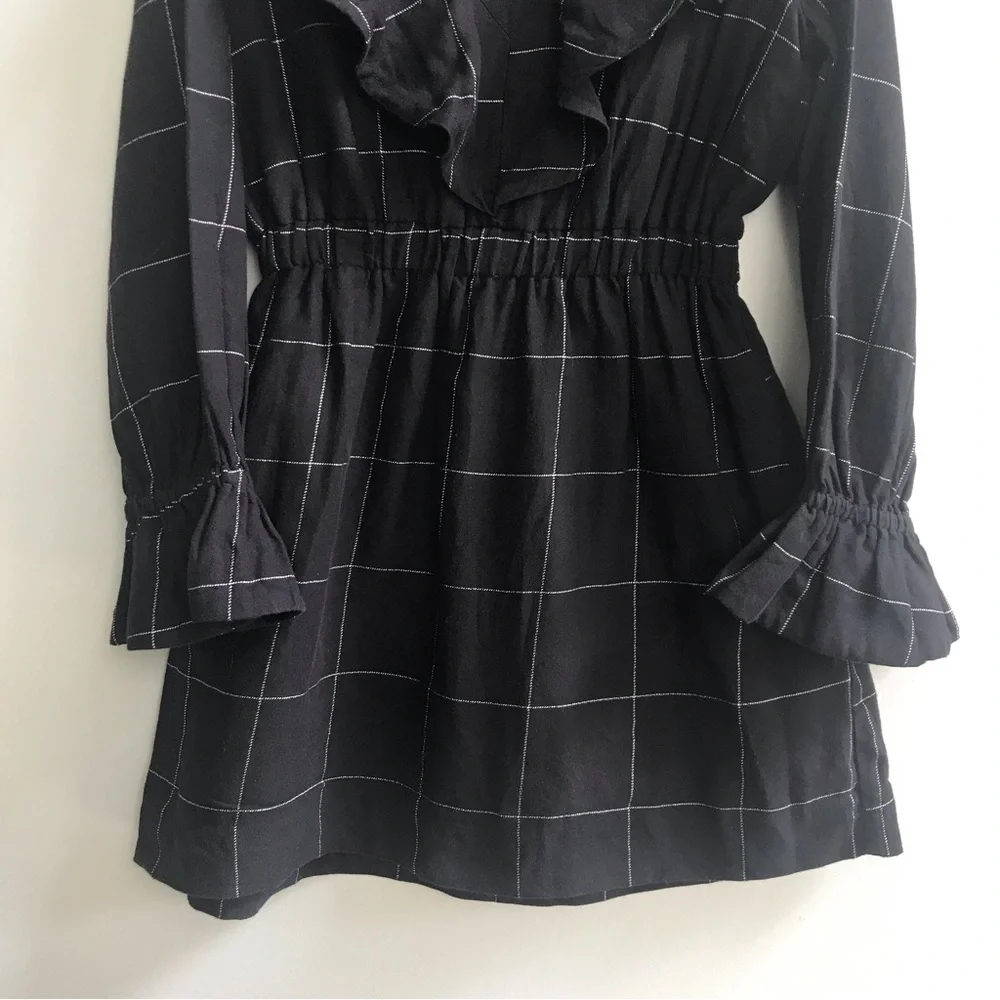 Nueces ruffled black dress, size 6A.